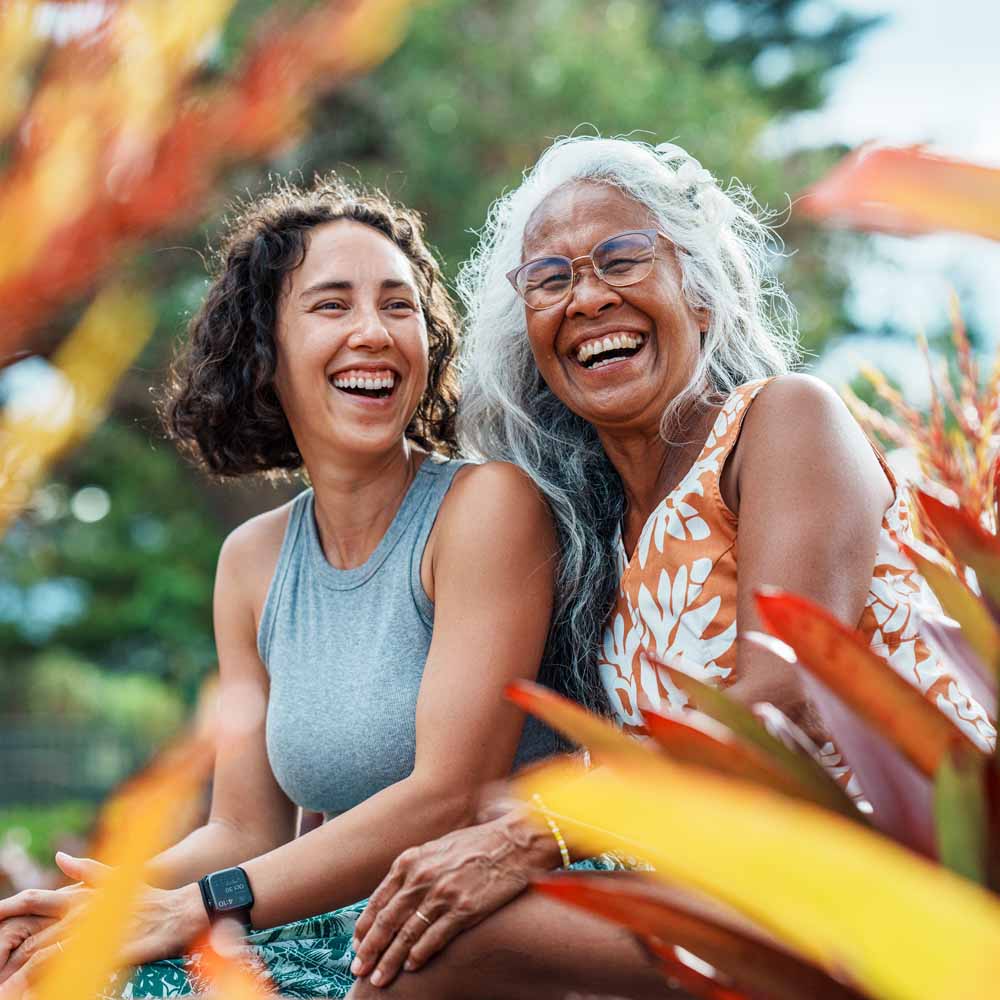 Mother and adult daughter spending time together outdoors